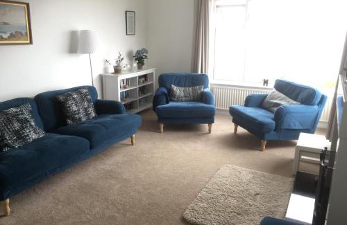 Cushendall House | Dalriada Crescent: Family-Friendly Retreat with 9.8 Rating