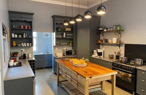 Parys House | Discover Dam'n Devine: Family-Friendly with Pool Access