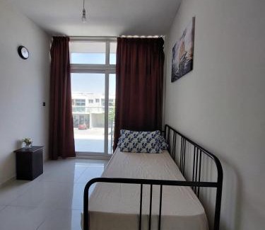 Dubai House | Damac Hills 2- Relaxing 3BR townhouse - Homeyvillas