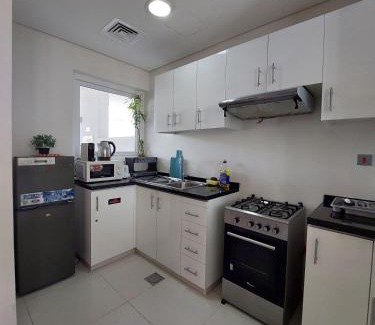 Dubai House | Damac Hills 2- Relaxing 3BR townhouse - Homeyvillas