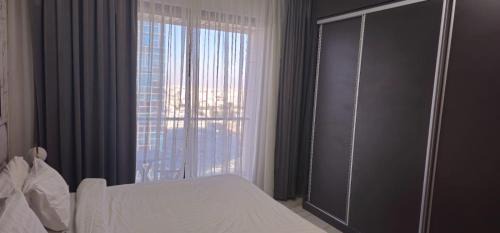 Al Abdali Apartment | Elegant Studio at Damac Tower Amman with Pool & Hot Tub