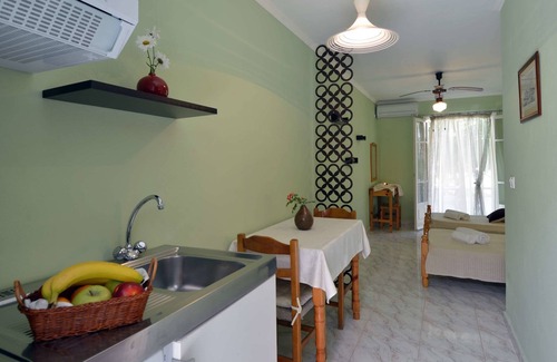 Kassiopi Apartment | Inviting Damaskis Studios: Oceanfront Retreat in Kassiopi
