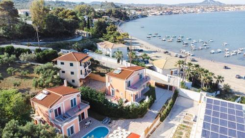 Agios Sostis Villa | Oceanfront Villa Danae: 4-Star Stay with Top Amenities