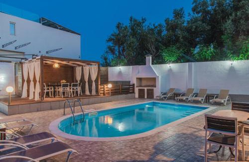 Agios Sostis Villa | Oceanfront Villa Danae: 4-Star Stay with Top Amenities