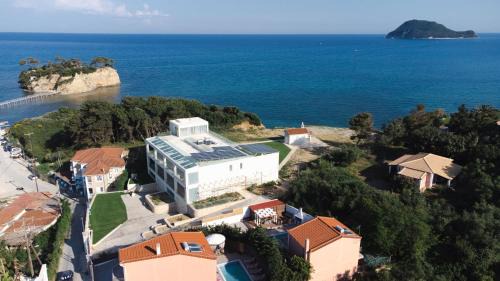 Agios Sostis Villa | Oceanfront Villa Danae: 4-Star Stay with Top Amenities