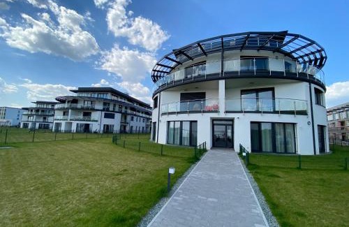 Keszthely Apartment | Discover Dandelion Royal Homes: Oceanfront Bliss Awaits