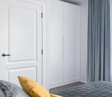Old Town Apartment | Top-Rated Dangė Riverside Apartment - Family-Friendly Stay