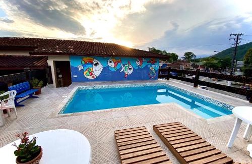 Boicucanga Beach Apartment | Oceanfront Dani Hotel: Guest Rated 8.6 with Pool Access