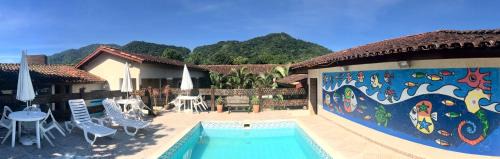 Boicucanga Beach Apartment | Oceanfront Dani Hotel: Guest Rated 8.6 with Pool Access
