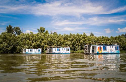 Murighiol Boat Rental | Experience Danubiu House Boat: Private Beach & Ocean Views