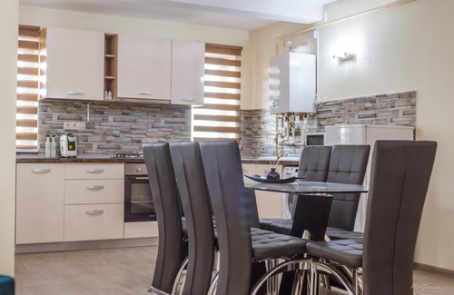 Pitesti Apartment | Discover Dany Rent A Home: Child-Friendly & Hot Tub Oasis