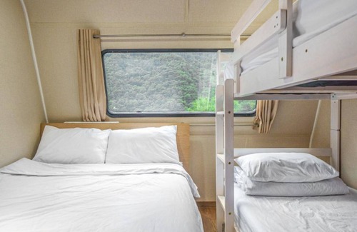 Danyang House | Eco-Friendly Danyang Pine Caravan Camping with Family Amenities