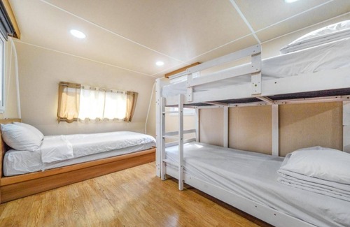 Danyang House | Eco-Friendly Danyang Pine Caravan Camping with Family Amenities