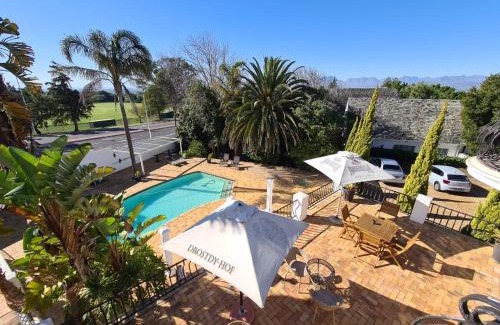 Eversdal House | Relax at Dark Chocolate Guest House with Pool & Dining