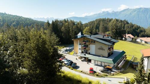 Mosern Apartment | Top-Rated Das Aparthotel Olympia Tirol with Ocean Views