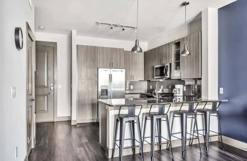 Richardson Apartment | Inviting 1BR Suite with Pool, Gym & Breakfast Included