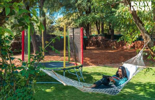 Bajarwadi Villa | Elegant Dawn Ecstasy: Hill-View Villa with Pool & Games