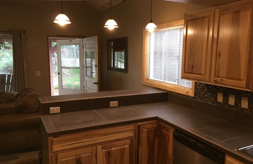 Cascade-Chipita Park Cabin | Idyllic Dawson Creekside Cabin with Pool & Family Amenities