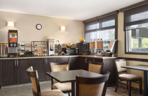 Montgomery Hotel | Pet Friendly Days Inn by Wyndham Calgary Northwest