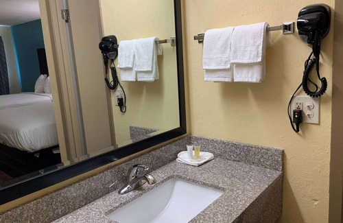 Troy Hotel | Comfortable Stay at Town & Country Inn with Family Amenities