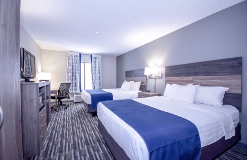 Wisconsin Dells Hotel | Welcoming Days Inn & Suites: Pool, Spa, and Family Fun