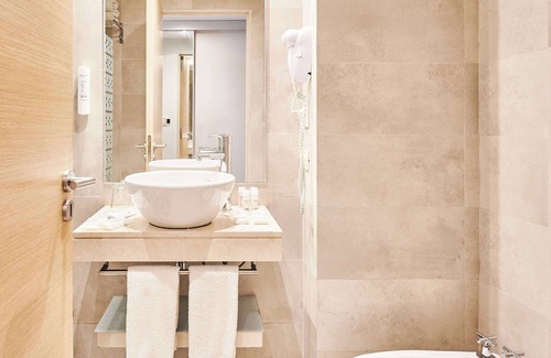Rosario Hotel | Discover Dazzler by Wyndham Rosario: Spa, Pool & More