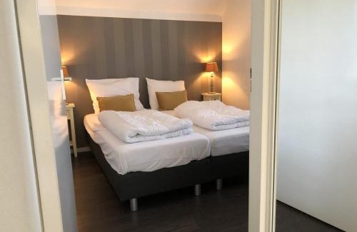 Lievelde House | De Essenburgh 7-persoons, overdekte hottub en lounge, barrel sauna, sunshower, wifi, omheinde tuin, huisdier vriendelijk