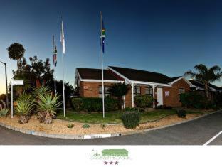 Trawal House | De Keurboom Guesthouse: Oceanfront Retreat with Breakfast