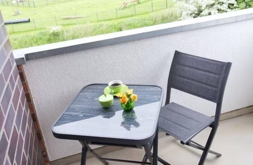 Wurster Nordseekuste Apartment | "De Kohbloom" - Relax on the North Sea in cozy dike proximity with balcony!
