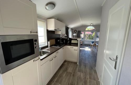 Sint-Annaland Resort | De Roos Chalet 174: Oceanfront Retreat with Hot Tub