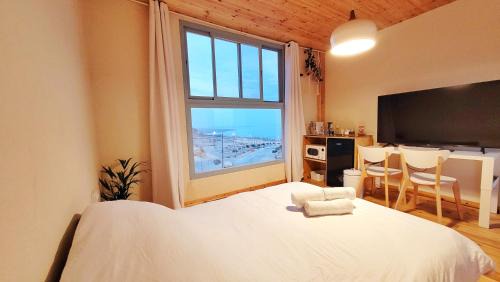 Al-Maghtas Apartment | Relax at Dead Sea Rooftop: Hot Tub & Breakfast Included