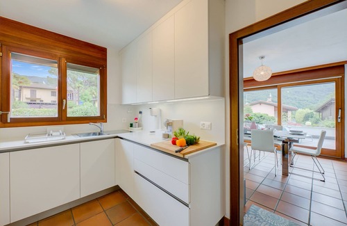 Sonvico Apartment | Deby Home: Scenic Lake Views & Family-Friendly Amenities