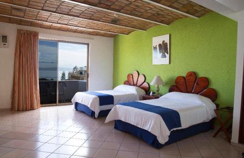 Rincon de Guayabitos Resort | Delightful Decameron Los Cocos: All-Inclusive Oceanfront Escape