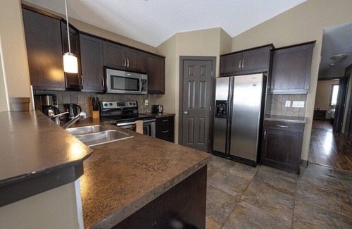 Grande Prairie House | Inviting Retreat with BBQ and Pet-Friendly Amenities