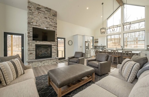 McHenry House | Relaxing Retreat: Lake Views, Hot Tub & Pool Awaits You!