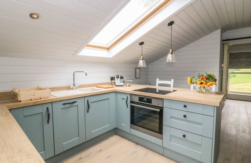 Blackburn Cottage | Relaxing Deer Lodge with Hot Tub in Langho, Lancashire