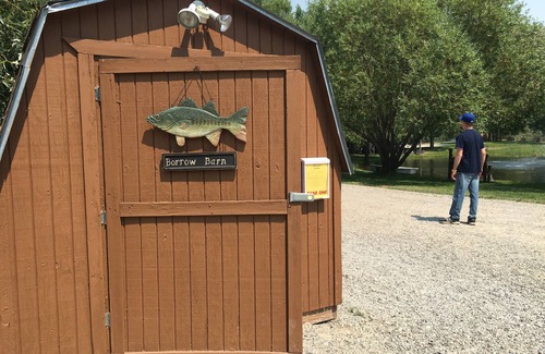 Rigby Cabin | Relaxing Log Cabin Retreat with Kitchenette & Pool Access