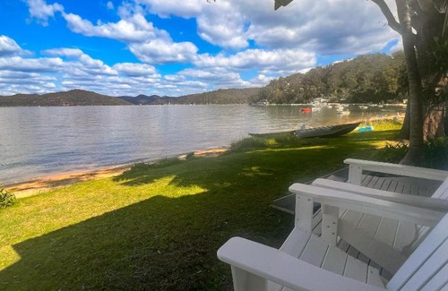 Dangar Island House | Discover Deerubbin Boat House: Oceanfront Paradise Awaits
