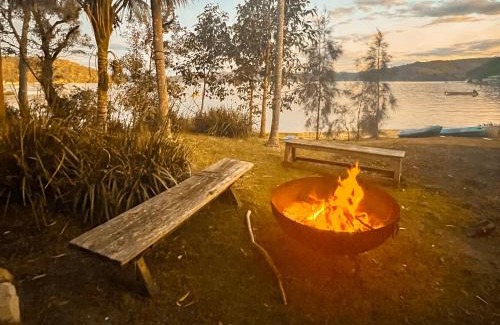 Dangar Island House | Discover Deerubbin Boat House: Oceanfront Paradise Awaits