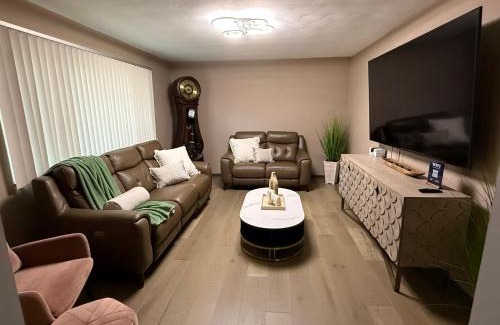 West Newton Apartment | Delightful 3 Bd Home with King size bed, hot tub, playground!