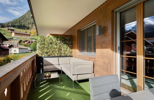 Gsteig Apartment | Inviting Flat with Breathtaking Views and Family-Friendly Amenities