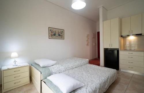Delfoi Apartment | Family-Friendly Retreat at Delphian Colors - Red Edition