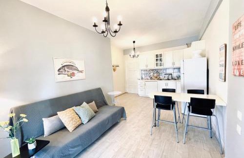 Roda Apartment | Ideal Delta Apartment with Ocean View Steps from the Beach
