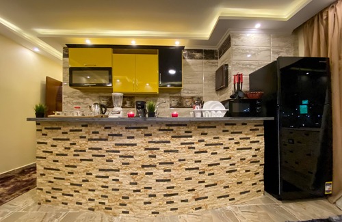 6th of October City House | Scenic Apartment with Pool and Pyramids View