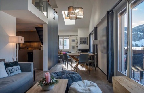 Gstaad Apartment | Elegant Mezzanine Apartment with Family-Friendly Amenities