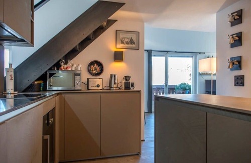 Gstaad Apartment | Elegant Mezzanine Apartment with Family-Friendly Amenities