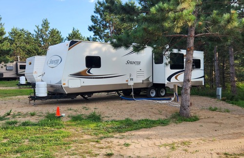 Nevis RV Rental | Top-Rated Deluxe Camper at Family-Friendly RV Park
