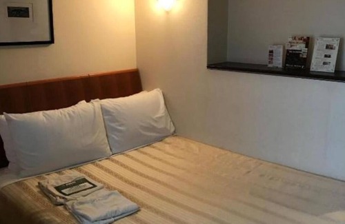 Matsuyama Hotel | Corner Room Retreat with Kitchen & Breakfast in Naha, Okinawa