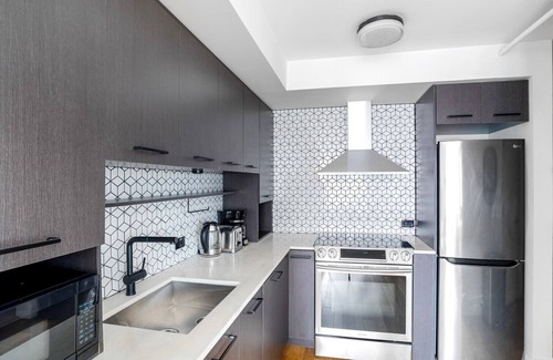 Ukrainian Village Apartment | Stylish East Village 2BR with Elevator & Pet-Friendly Perks