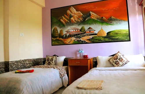 Sauraha Bed & Breakfast | Mountain View Room with King Bed - Family Friendly Stay